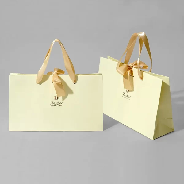 yellow paper bag, gift bag